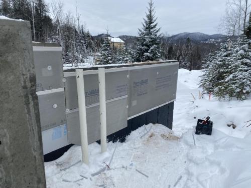 2024-12-09 Isolation des fondations et beton de protection